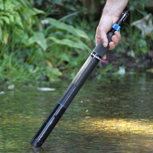 Water quality probe being used in a stream